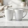 Product_on_minimal_202604132356.jpeg Ceramic Coffee Mug Set of 2 Elegant White Cups 300ml | Cerâmica Capuchos