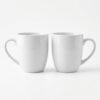 White_ceramic_coffee_202604132354.jpeg Ceramic Coffee Mug Set of 2 Elegant White Cups 300ml | Cerâmica Capuchos